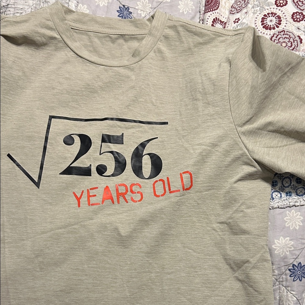 clever  Graphic T-Shirt. 16 unisex